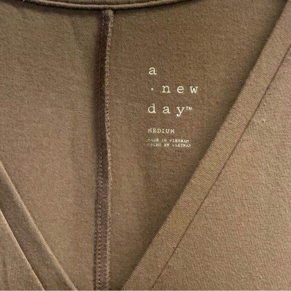 A New Day Sleeveless Ruffle Hem Knit Dress - Picture 3 of 5